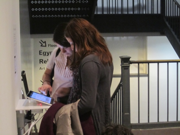 groups of visitors with ipad