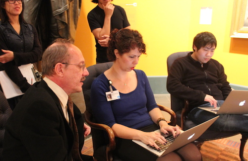 Kevin Stayton, chief curator answering visitor questions with Sara Devine typing them on the ASK dashboard.