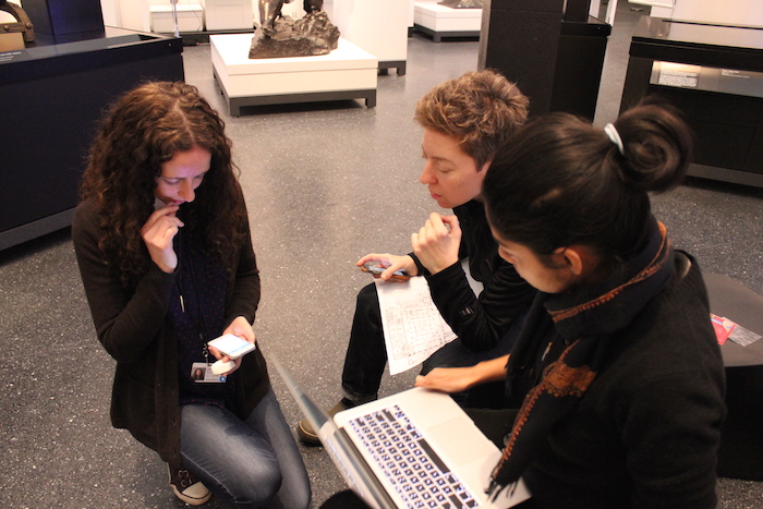 Jennie scans the beacon using the Estimote app so we can assign major/minor values.  I'm there with the paper map and Pritika is manning her beacon tool.  All this to install a few beacons in Connecting Cultures.