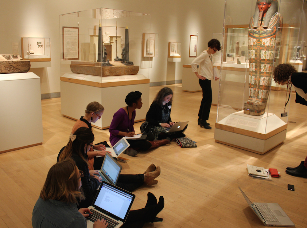 The Audience Engagement team working in the Egyptian galleries to write wiki content.