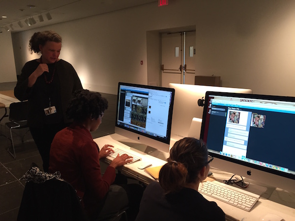 Joan Cummins, Lisa and Bernard Selz Curator of Asian Art, works with the ASK team to answer questions during a testing session.